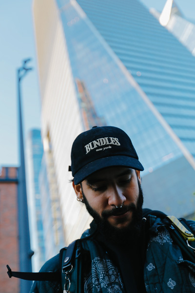 A person modeling a Bundles hat