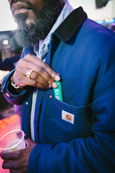 A person holding a lighter