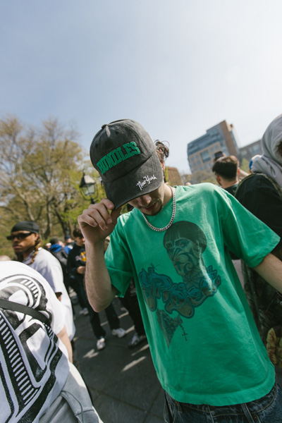A person holding a Bundles hat