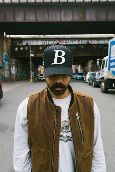 A person taking a photo in the streets of NYC